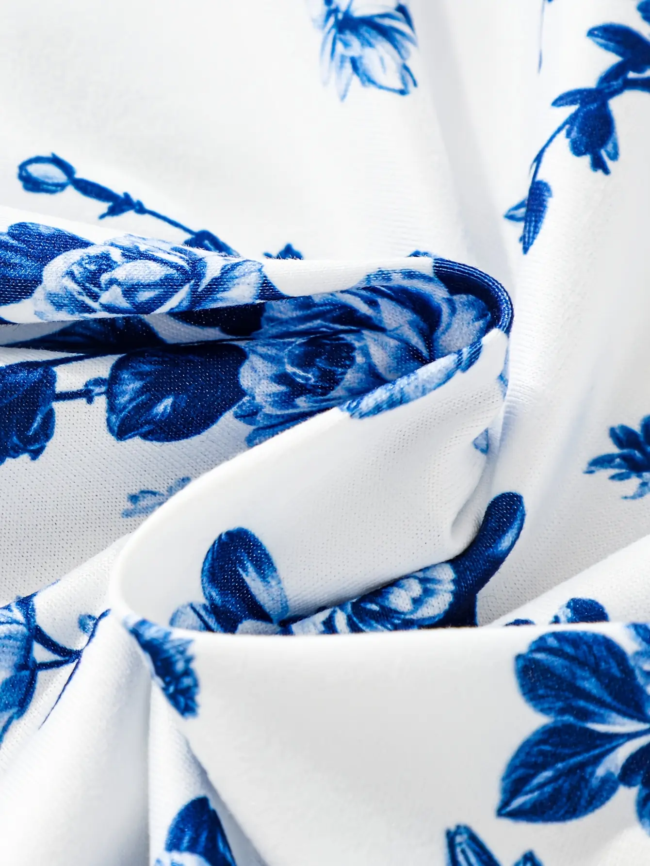 Girls Blue Floral Smocked Sundress detail view