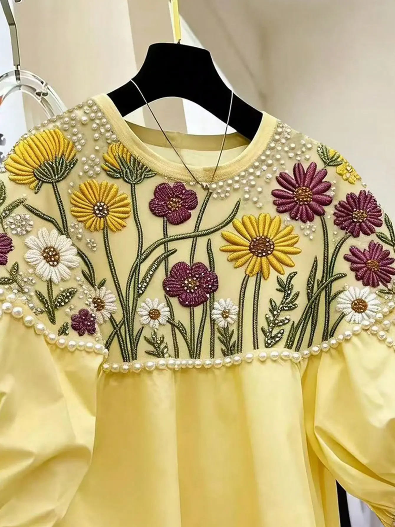 Yellow petal-sleeve top with daisy embroidery