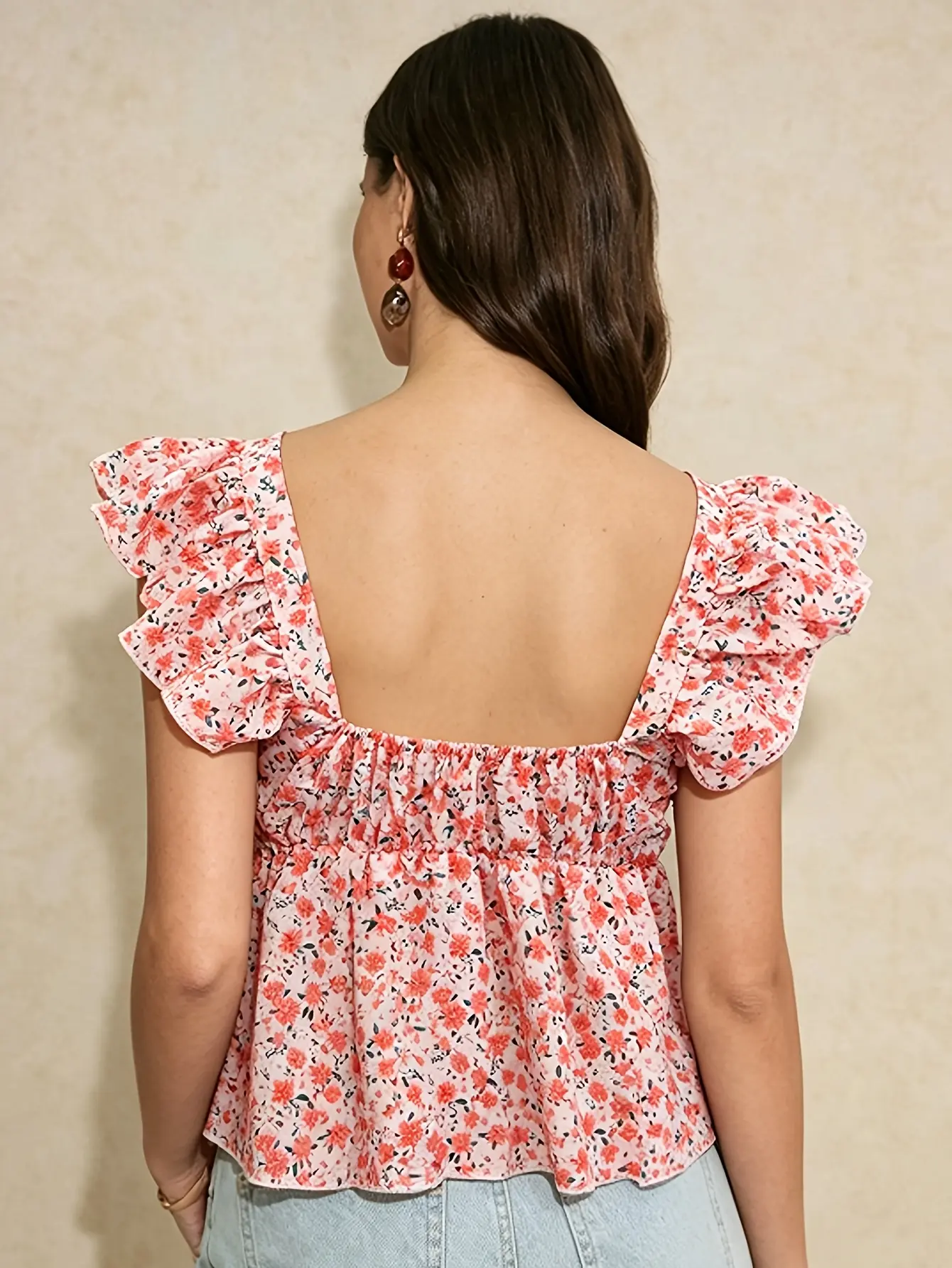 Women’s pink ditsy floral ruffle-trim peplum top back view