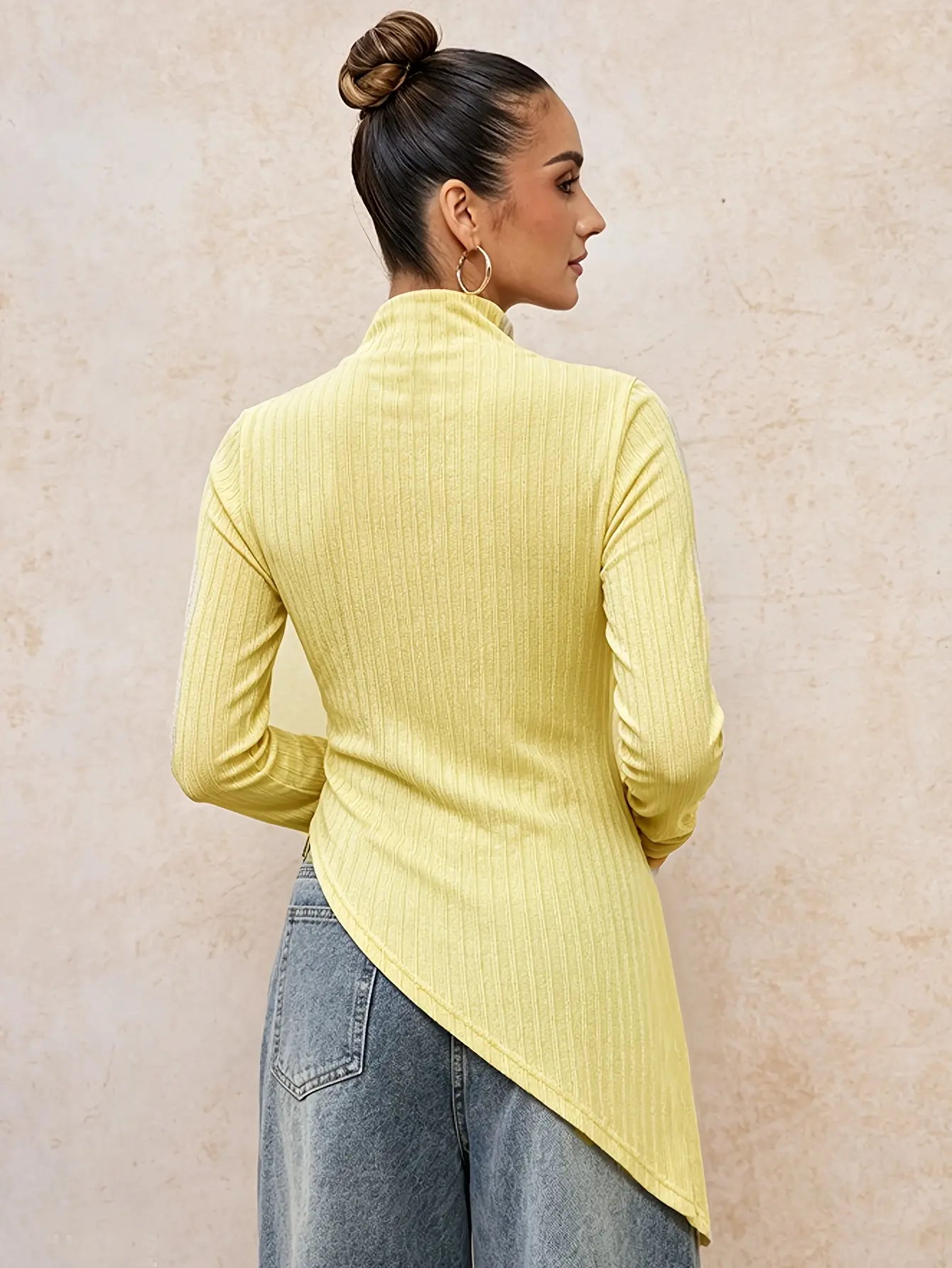 Women’s pale yellow ruched asymmetric top back view