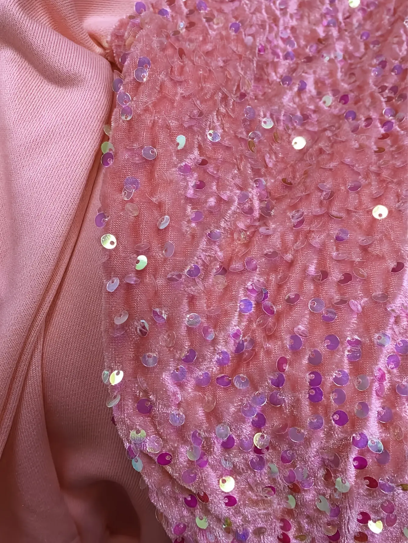 Close-up of pink sequin sleeve detail