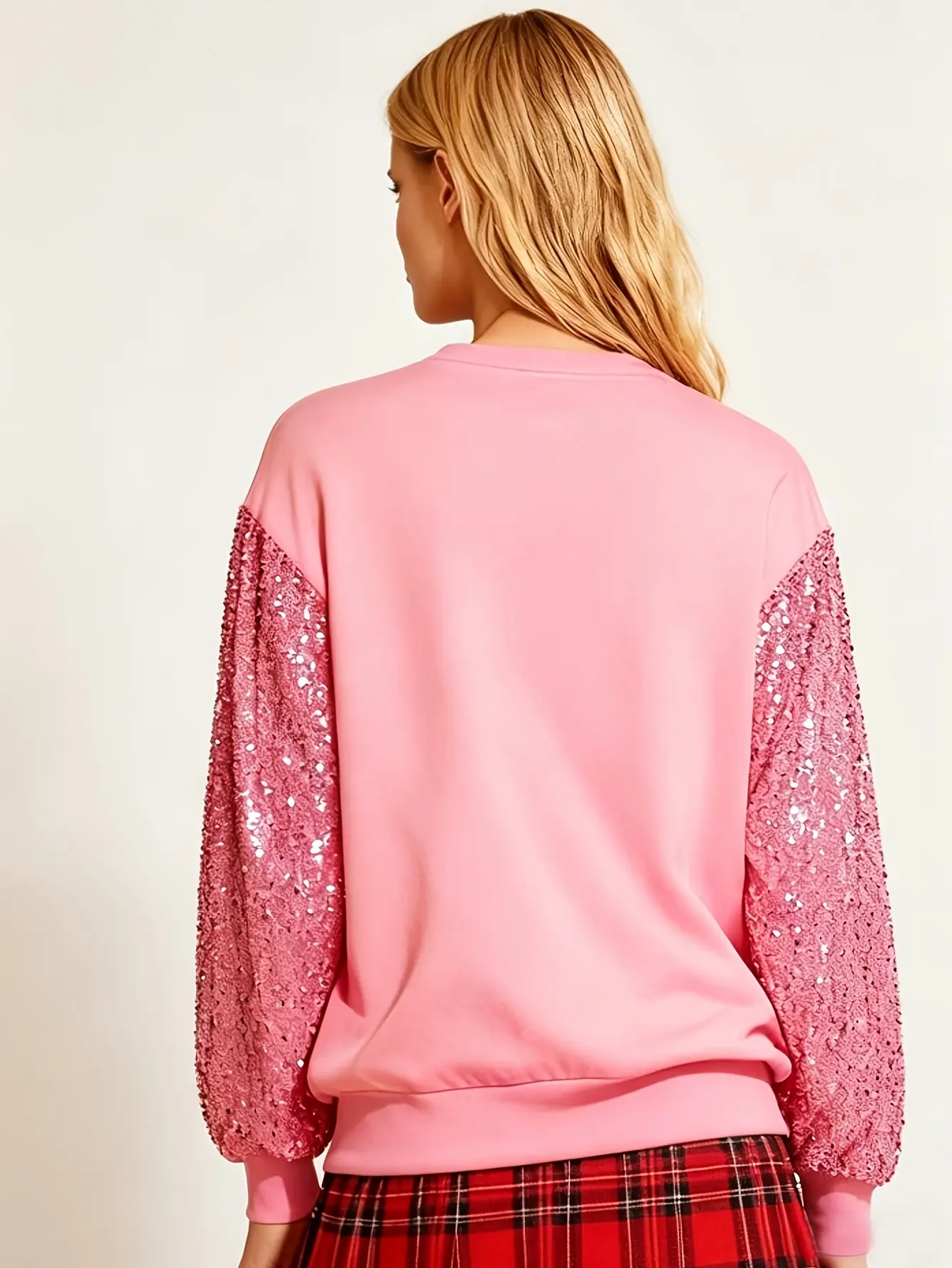 Back view of pink sequin-sleeve sweatshirt
